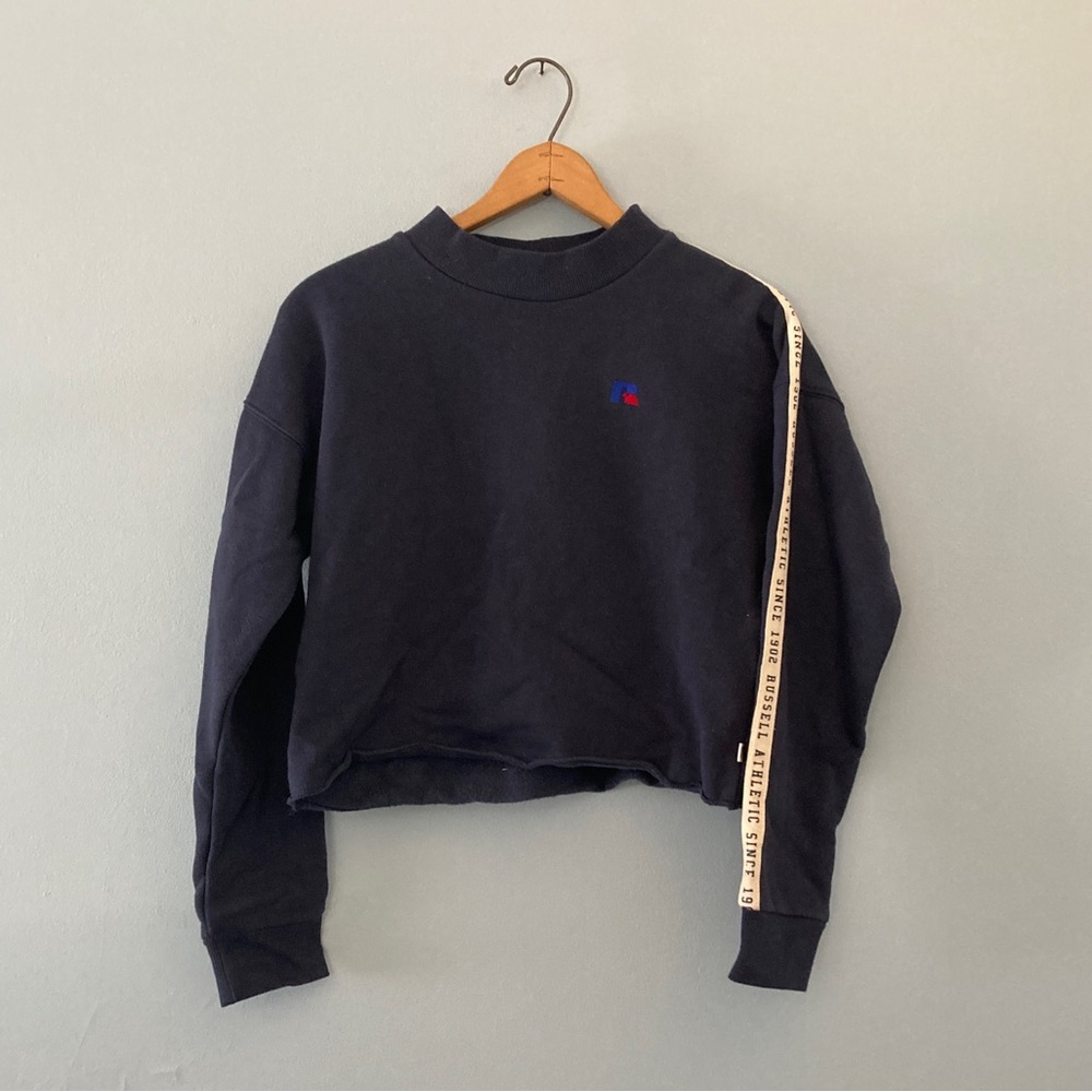 Russel Athletic women’s mid-crop twill tape fleece sweater.